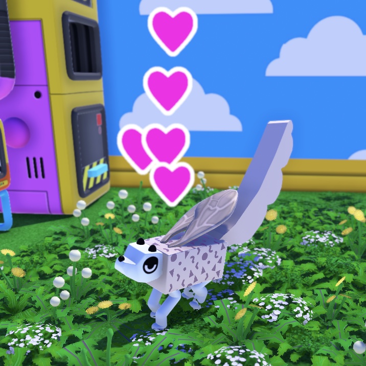 a white wobble dog with wings and a long tail